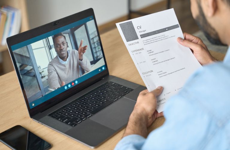 Remote Employee on a Zoom Call on Their Laptop